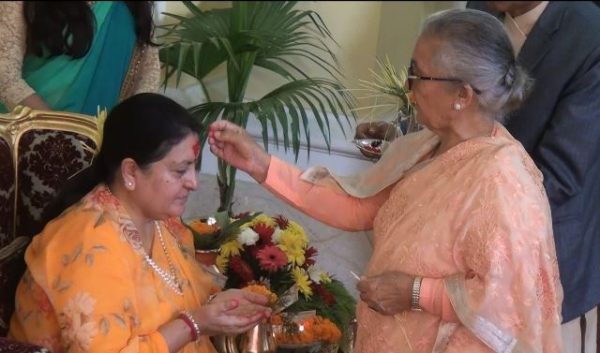 President Bhandari receives Dashain tika from her mother