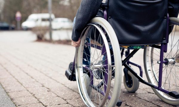 Wheelchairs and tricycles distributed to physically disabled