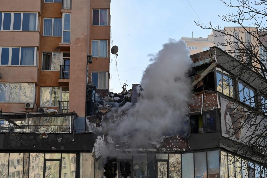 Russian Missile hits high rise building in Ukraine, Ukrainian president refuses to flee