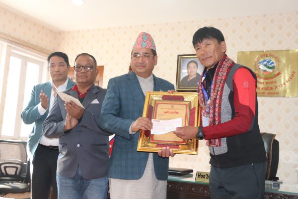 Tourism Minister hands over his one month salary to Sanu Sherpa for World Record