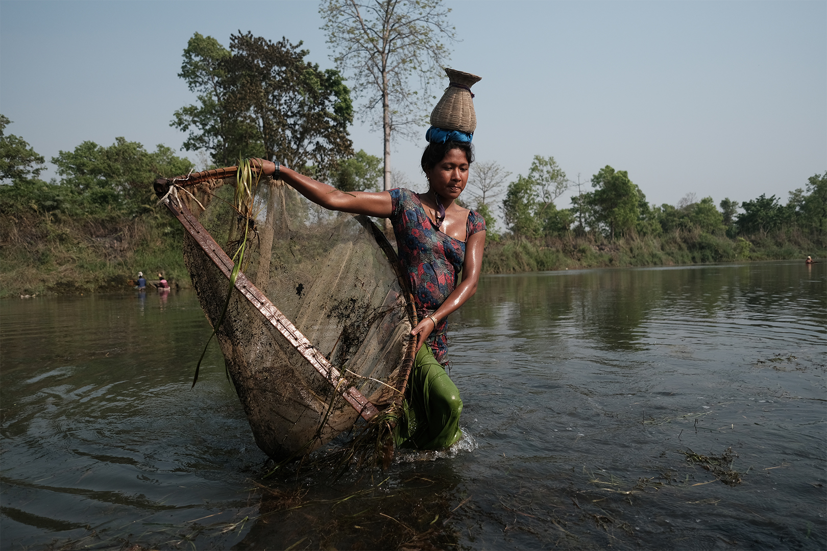 Bardiya's Tharu women embrace traditional fishing culture to beat the heat  (photo essay) - DCnepal